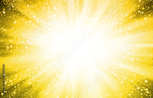 Gold and Yellow sparkle rays glitter lights with bokeh elegant abstract holiday background.