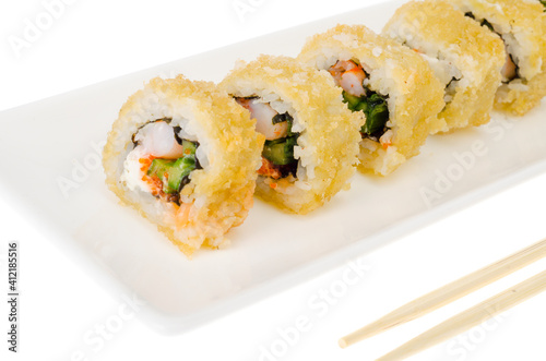 Warm prawn rolls isolated on white plate.