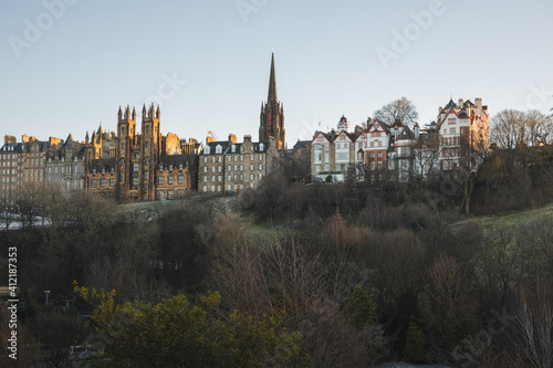 View from Princes Street Gardens of Edinburgh old town skyline and Ramsay Garden  on Castlehill on a clear day in the Scotland capital city.