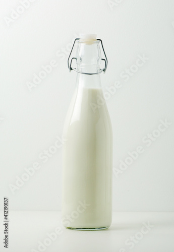 A glass bottle filled with milk