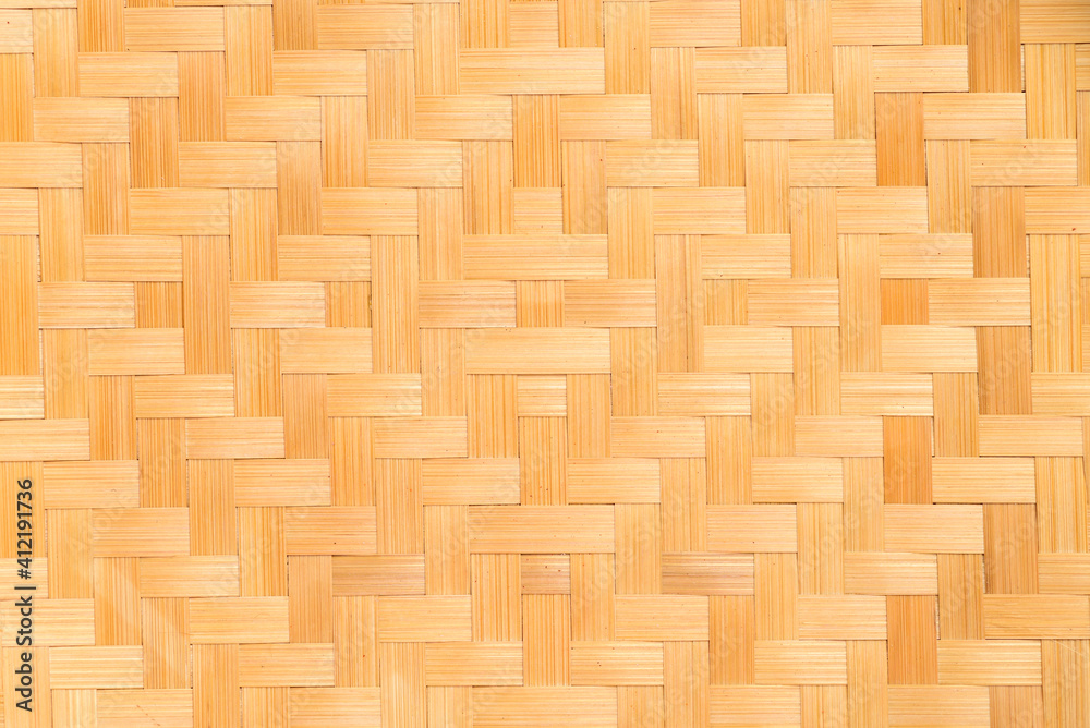 Brown woven bamboo pattern texture background, Thai style handicraft from natural product Brown woven bamboo pattern texture background, Thai style handicraft from natural product