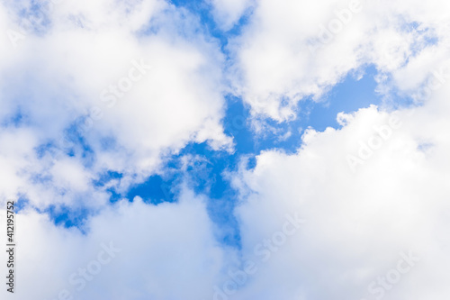 blue sky with clouds on a bright Sunny day. space for copying text