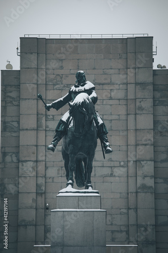 Statue of Jan Zizka at Vítkov hill memorial National Monument covered in snow during winter in Prague photo