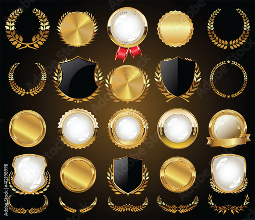 Collection of golden badges labels laurels and ribbons 