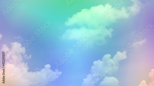 beauty soft green sweet pastel with fluffy clouds on sky. multi color rainbow image. abstract fantasy growing light
