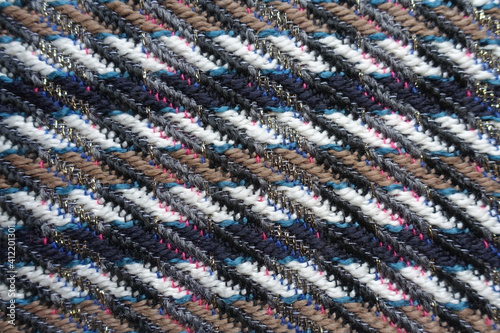 Background - multicolored woolen tweed fabric with lurex