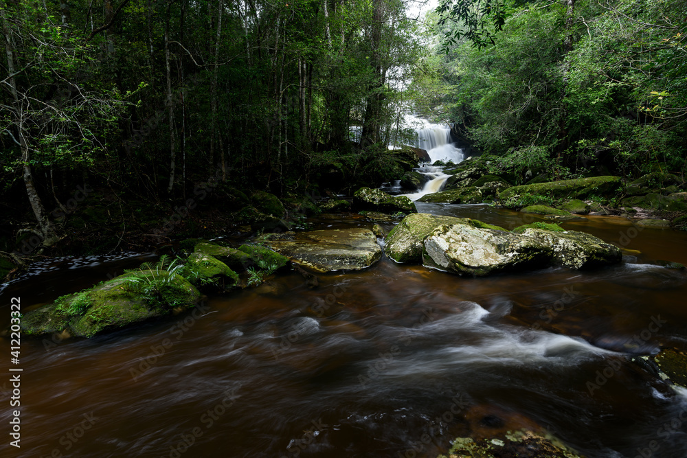Obraz premium Beautiful deep forest waterfall at Thailand.