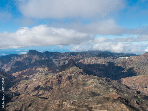 Amazing view from Roque Nublo plateau on central volcanic mountains with Caldera and Barranco de Tejeda and Roque Bentayg rock. Gran Canaria, Canary Islands, Spain.