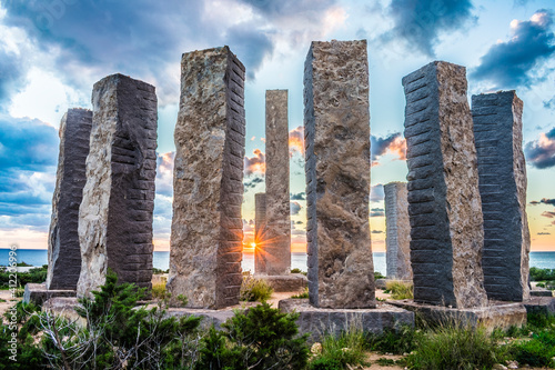 A round of pilars in the sunset photo