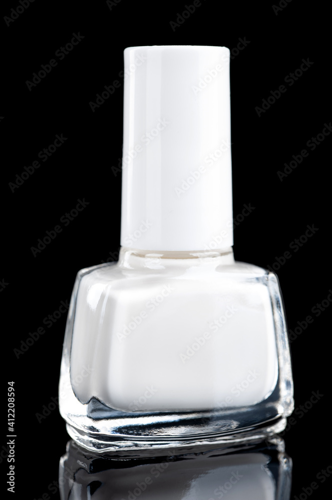 white nail polish on a black background close-up. copy space white nail polish on a black background close-up. copy space