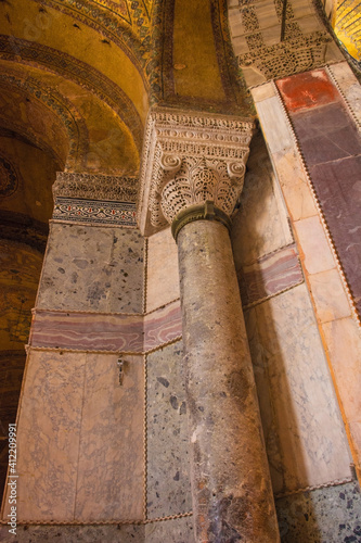 A wall and column in Ayasofia or Hagia Sofia in Sultanahmet, Istanbul, Turkey, taken on the ground floor. Built in 537 AD as a church, it was converted into a mosque in the mid-1400s.    © dragoncello