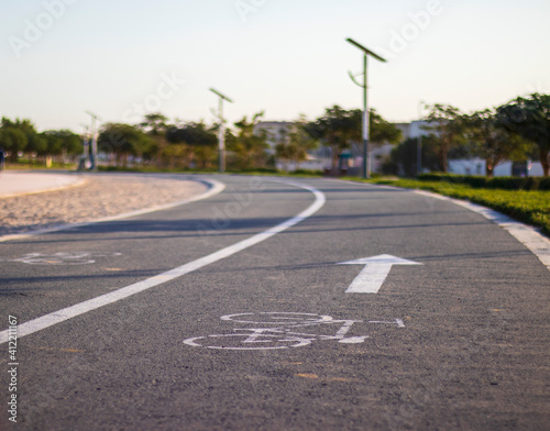 Canvas Print Jogging and cycling tracks in Al Warqa park, Dubai, UAE early in the morning