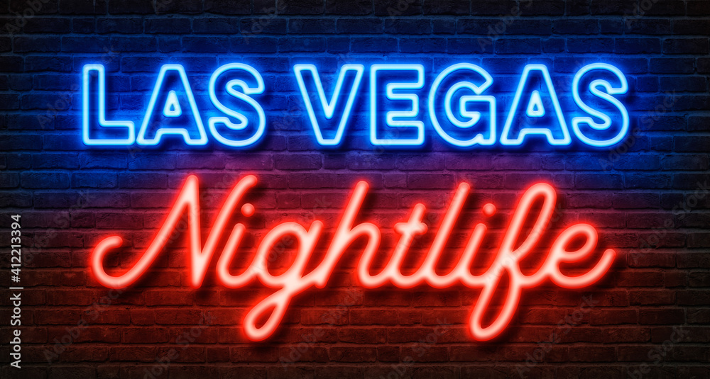 Neon sign on a brick wall - Las Vegas Nightlife