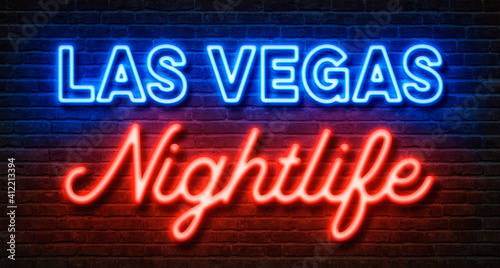Neon sign on a brick wall - Las Vegas Nightlife