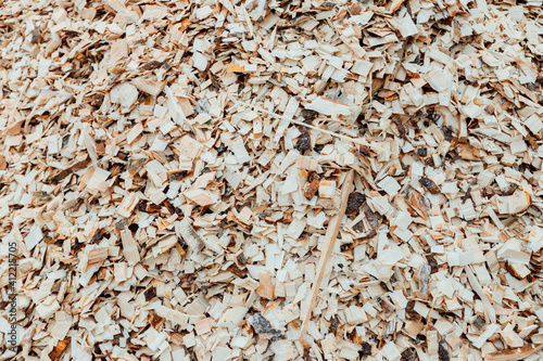 sawdust and wood shavings. background and texture of wood processing waste