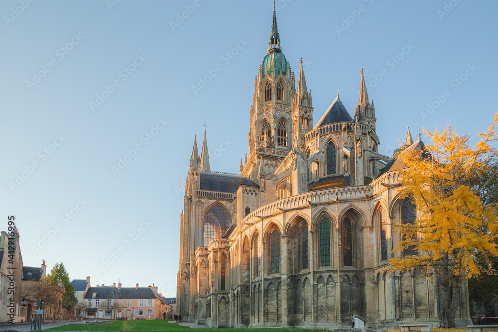 The Bayeux Notre Dame Cathedral on a sunny afternoon in the historic centre of Bayeux in Normandy, France.
