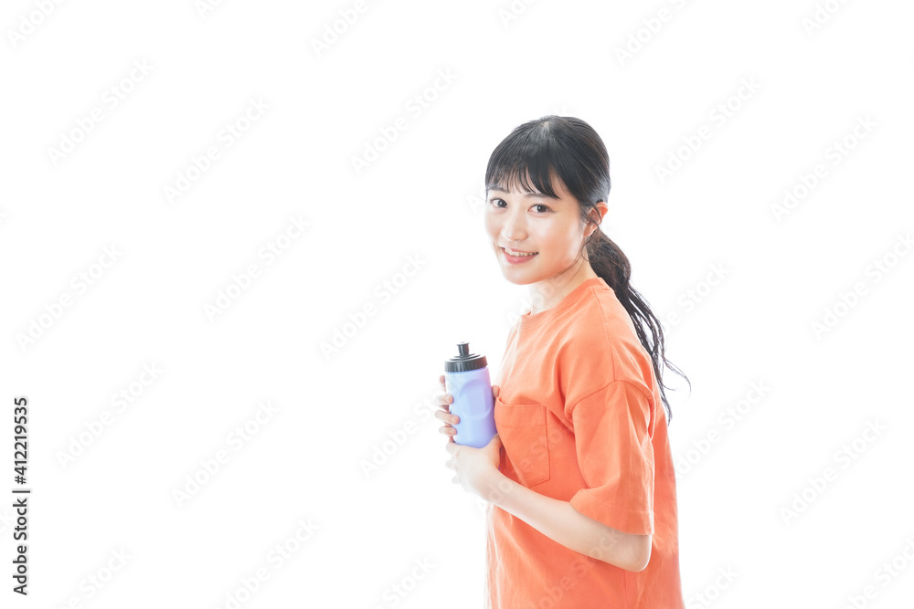 プロテインを飲む若い女性 プロテインを飲む若い女性