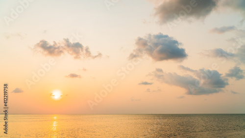 sunset over the sea in the evening with colorful orange sunlight 