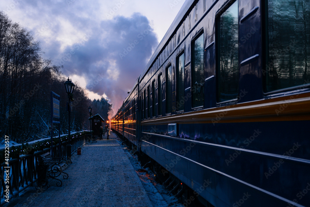 Ruskeala, Russia - January 15, 2021: Steam train Ruskeala express following the route from Sortavala to Ruskeala