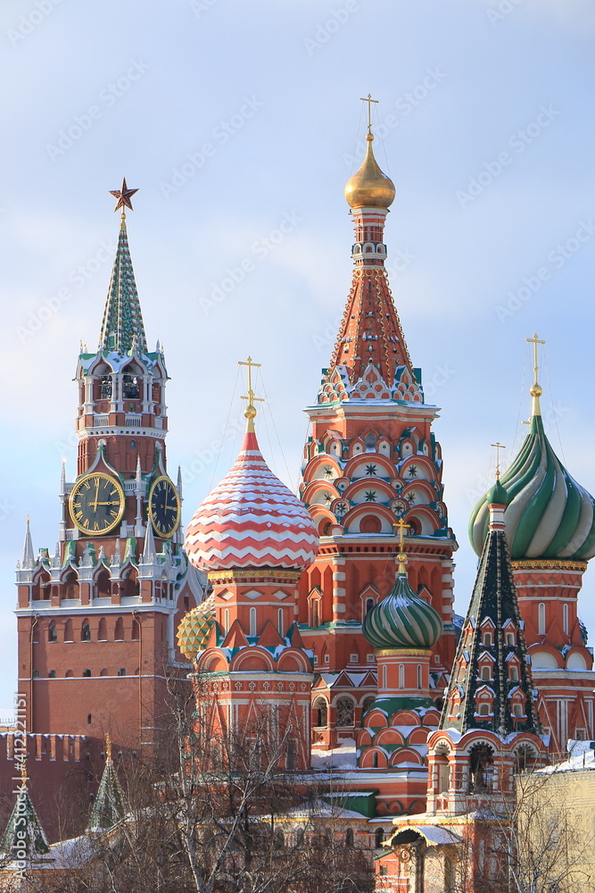 St. Basil's Cathedral and the Spasskaya Tower of the Moscow Kremlin on Red Square St. Basil's Cathedral and the Spasskaya Tower of the Moscow Kremlin on Red Square