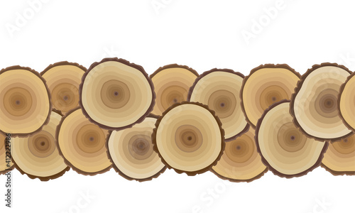 A border from wood cuts. Hand drawn seamless wood pattern. Natural browns. Tree rings print. Concept of sawmill background, cross section of tree, wooden texture illustration. Vector.