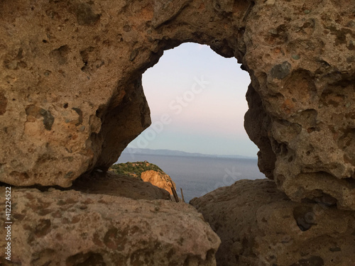 view of the sea from a rock window