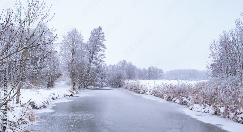 frozen river at a cold winter morning frozen river at a cold winter morning
