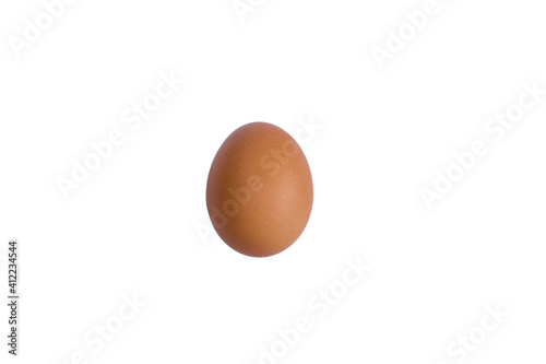 A chicken egg isolated on a white background. An egg in a red shell.