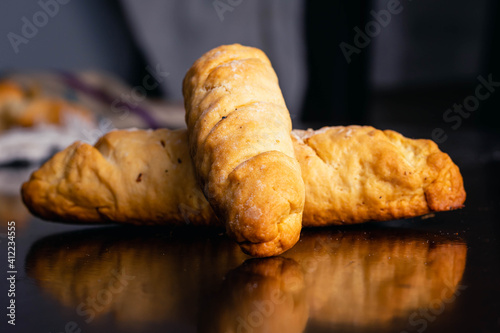 Fototapet croissant brad on wooden table