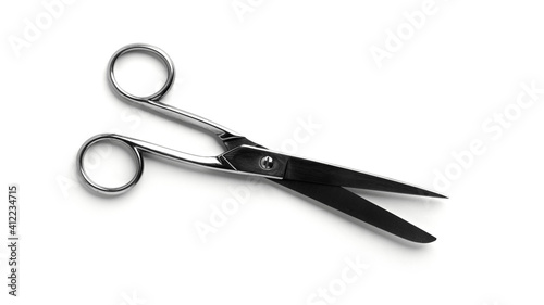 Metal scissors isolated on a white background. © jul_photolover