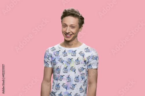 Wallpaper Mural Positive cheerful caucasian guy. Happy smiling teenage boy isolated on pink background. Torontodigital.ca