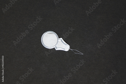 Εκτύπωση καμβά Needle threader in a dark background