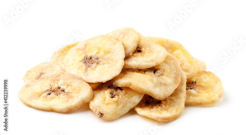 Banana chips heap on a white background. Isolated