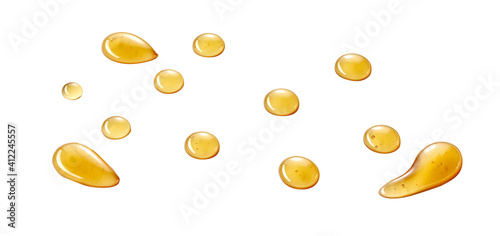 Blobs of yellow sauce on white background