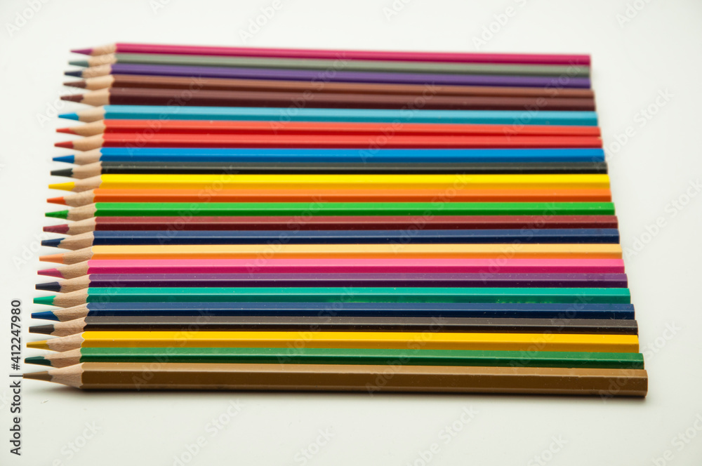 colored pencils on a white background. education concept. illustration of training. colored pencils on a white background. education concept. illustration of training.