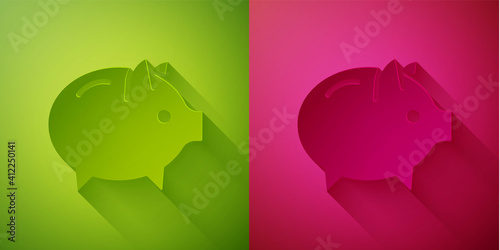 Paper cut Piggy bank icon isolated on green and pink background. Icon saving or accumulation of money, investment. Paper art style. Vector.