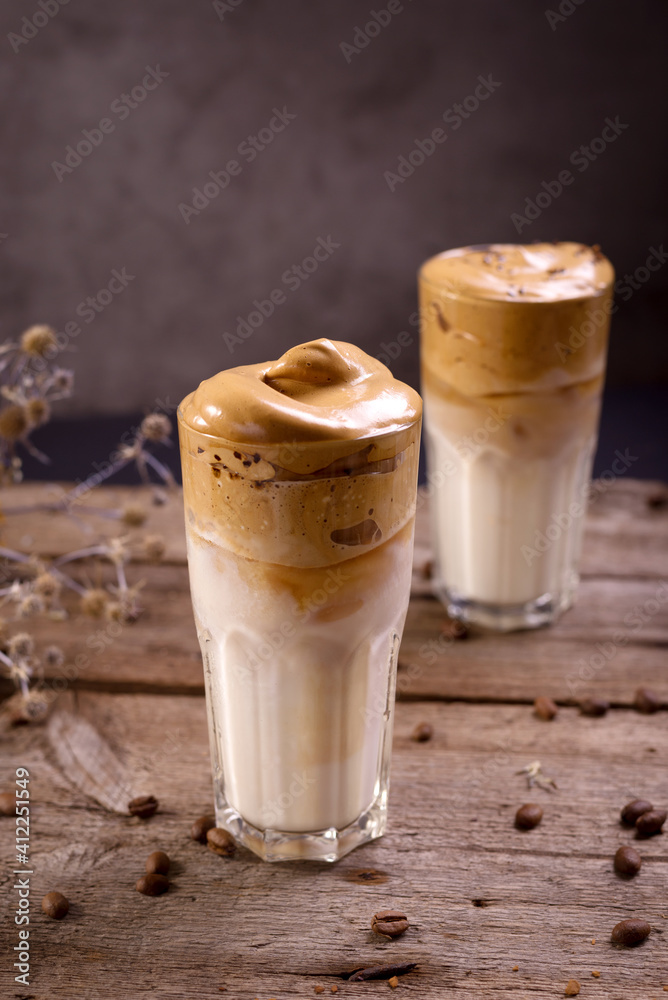 Dalgona Coffee. Whipped icing drink with instant coffee popular in Korea Creamy cocktail in tall Glasses. Dalgona Coffee. Whipped icing drink with instant coffee popular in Korea Creamy cocktail in tall Glasses.