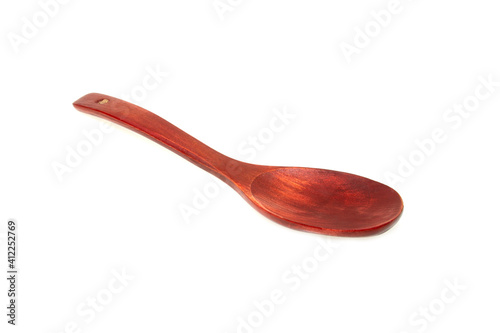 Wooden spoon on a white background