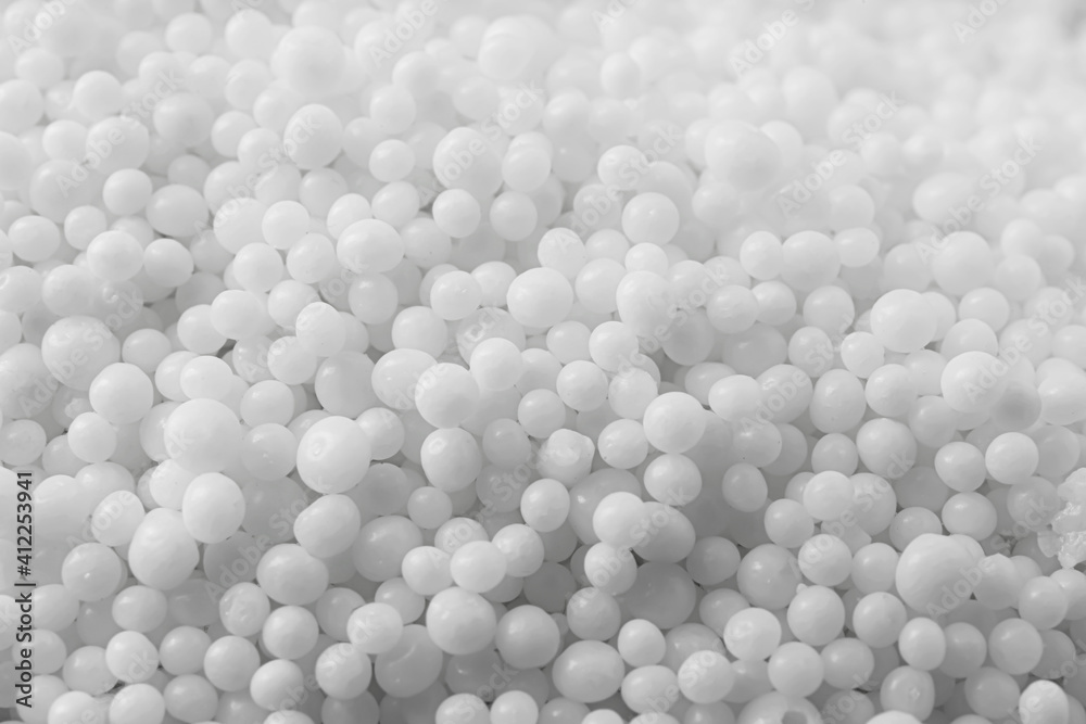 Pellets of ammonium nitrate as background, closeup. Mineral fertilizer Pellets of ammonium nitrate as background, closeup. Mineral fertilizer