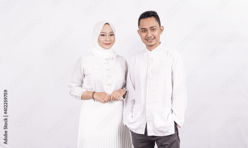 Asian moslem couple wearing moslem clothes Asian moslem couple wearing moslem clothes