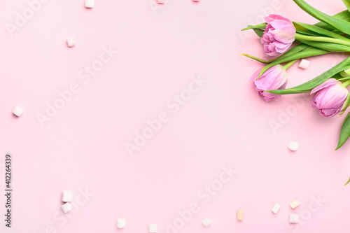 Fototapeta Naklejka Na Ścianę i Meble -  Beautiful tulip flowers with marshmallows on color background