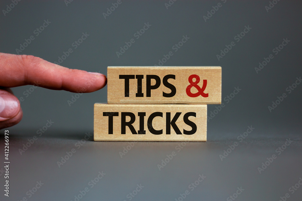 Tips and tricks symbol. Wooden blocks with words 'Tips and tricks ...