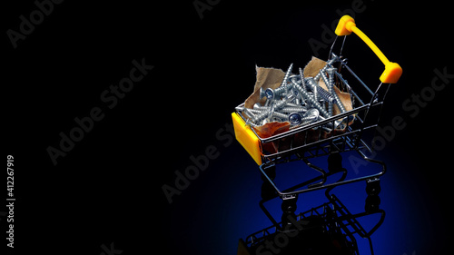 The steel screws lie on the kraft paper in a small basket. An advertising banner for a fastener supplier with copy space. Dark background. Ready-made billboard
