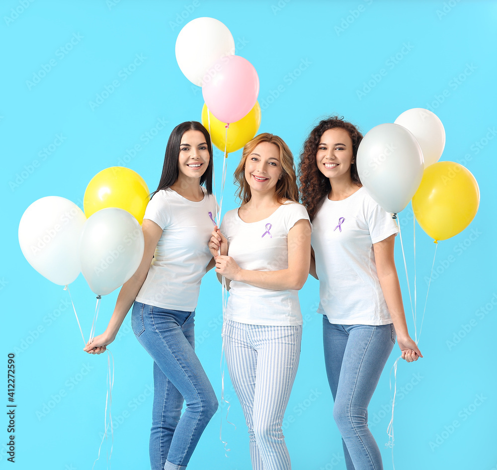 Beautiful women with balloons on color background. International Women