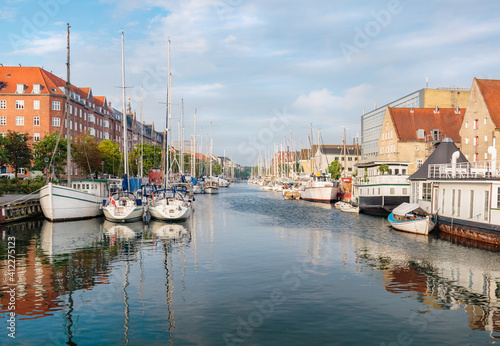 reflection of boats on a canal in Copenhagen, Denmark