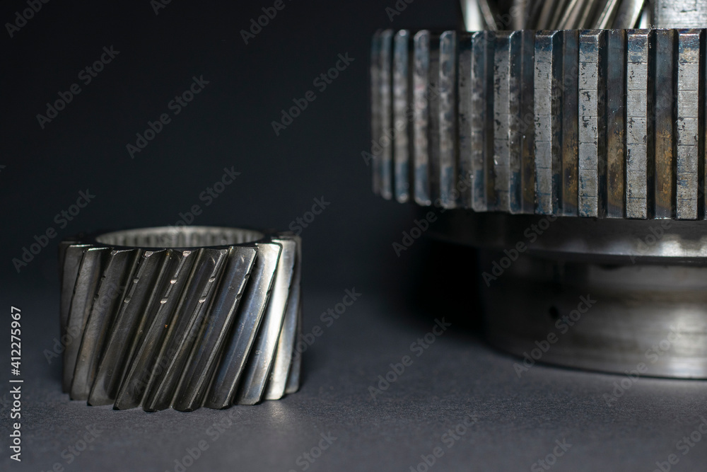 Gear set on black background, macro photo Gear set on black background, macro photo