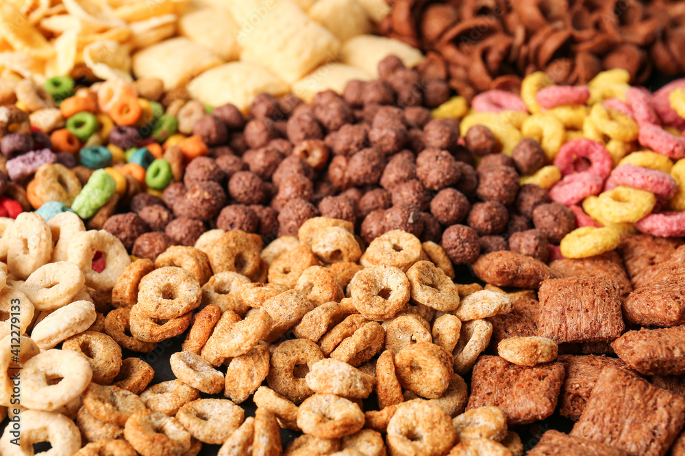 Fototapeta premium Heap of tasty breakfast cereals as background