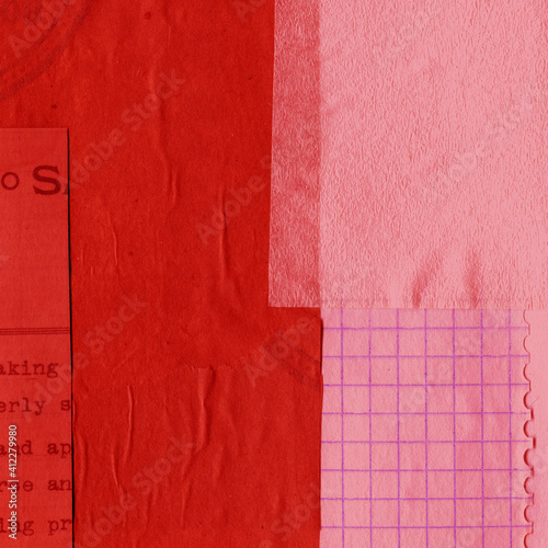 Red and brown torn paper collage close-up. Texture made from various paper and cardboard parts. Damaged old paper background. Vintage blank wallpaper. Material design backdrop.