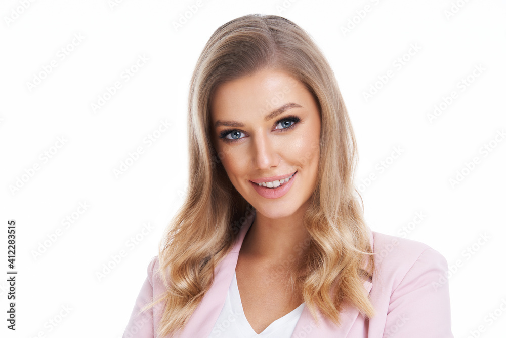 Blond woman in pastel suit posing over white background Blond woman in pastel suit posing over white background