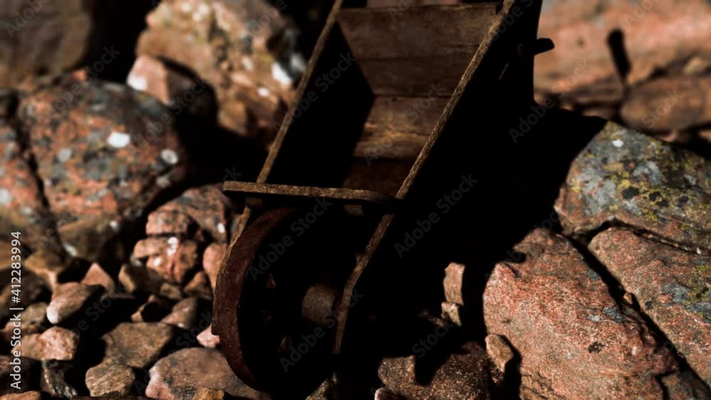 abandoned wooden mine wheelbarrow on rocks abandoned wooden mine wheelbarrow on rocks
